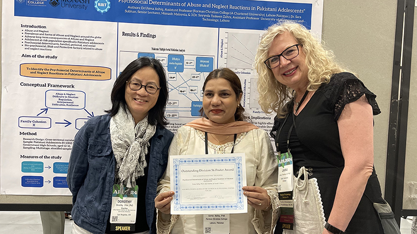 Dorothy Chin presenting an award at APA 2024.