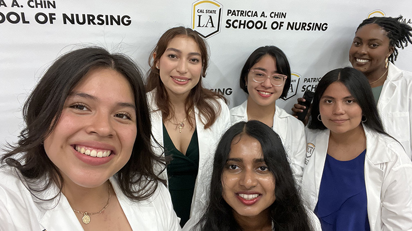 Jacqueline with students at the Chin School of Nursing