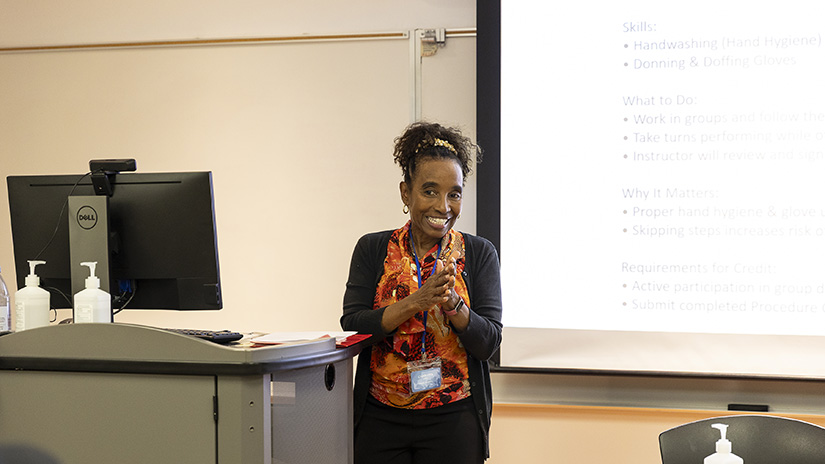 Chiquita "Dr. Chi" Emel teaching class